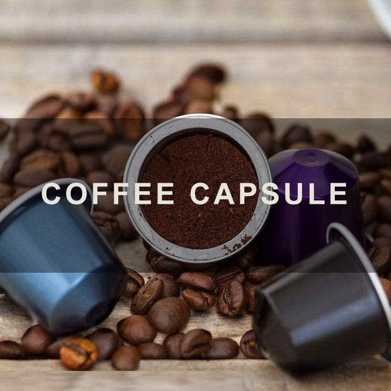 Coffee capsule filling and sealing machine